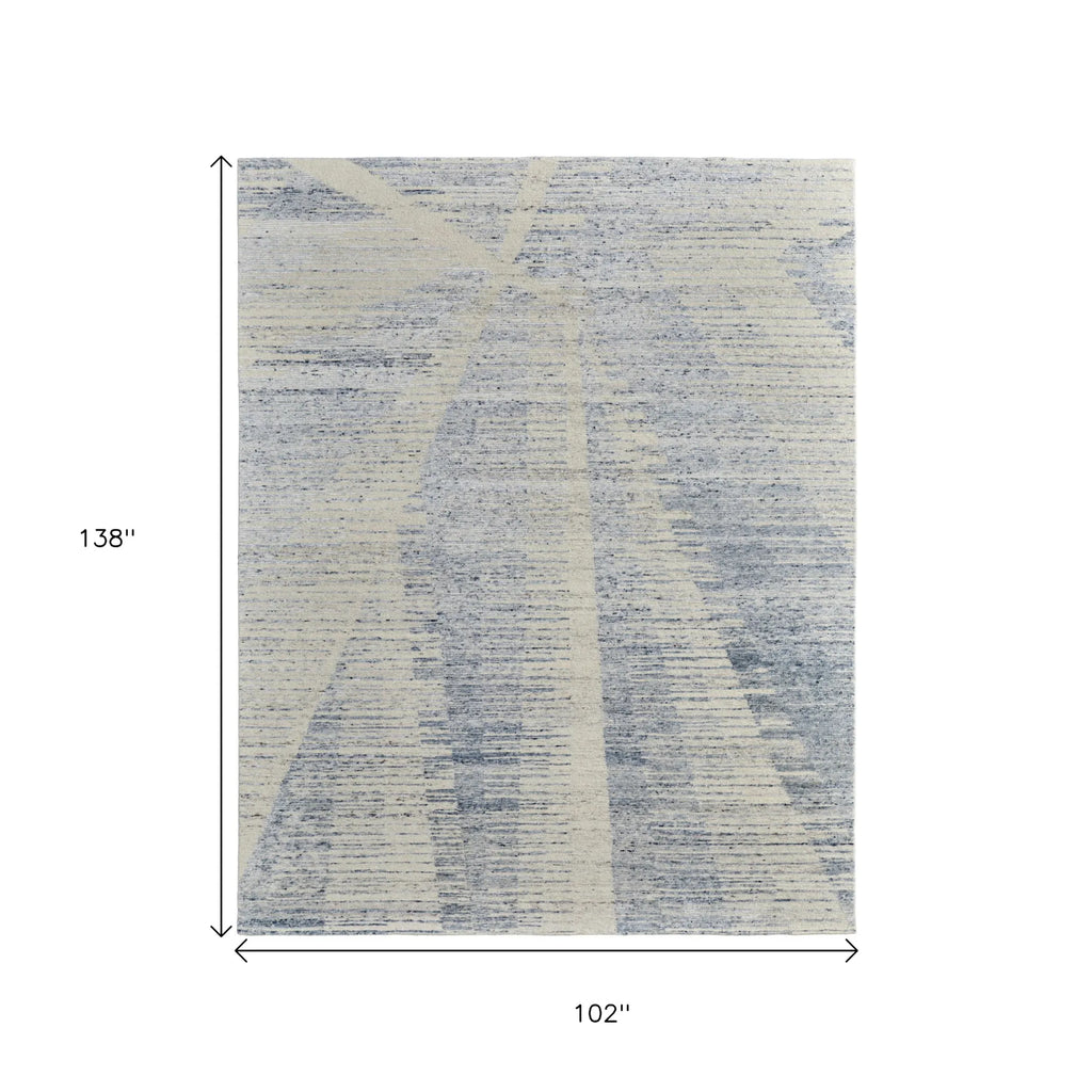 8' X 12' Ivory Blue And Silver Abstract Hand Knotted Distressed Area Rug